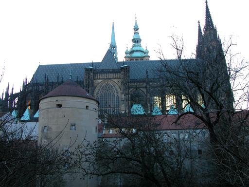 castle wall, turret, and cathedral from outside